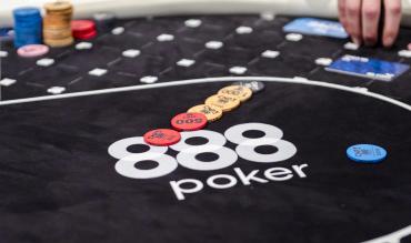 poker chips stacked on an 888poker tournament table