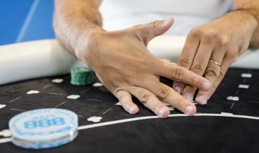 poker playing checking hand